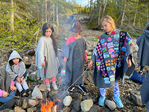 girls at the campfire