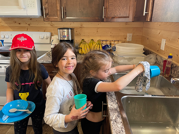 girls doing dishes